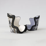 Motif <span data-wg-notranslate>Asteroik Lila</span> placé, adaptable aux dimensions exactes de votre prothèse tibiale, prothèse fémorale, prothèse bras et manchon, ou votre orthèse, corset, corset siège, cruro-pédieuse, releveur, prepreg.