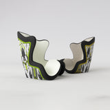 Motif <span data-wg-notranslate>Asteroik Yellow</span> placé, adaptable aux dimensions exactes de votre prothèse tibiale, prothèse fémorale, prothèse bras et manchon, ou votre orthèse, corset, corset siège, cruro-pédieuse, releveur, prepreg.